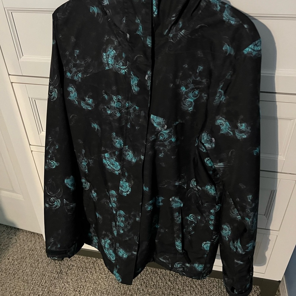 Women’s Black and Teal Jacket, zipper is a bit sticky.